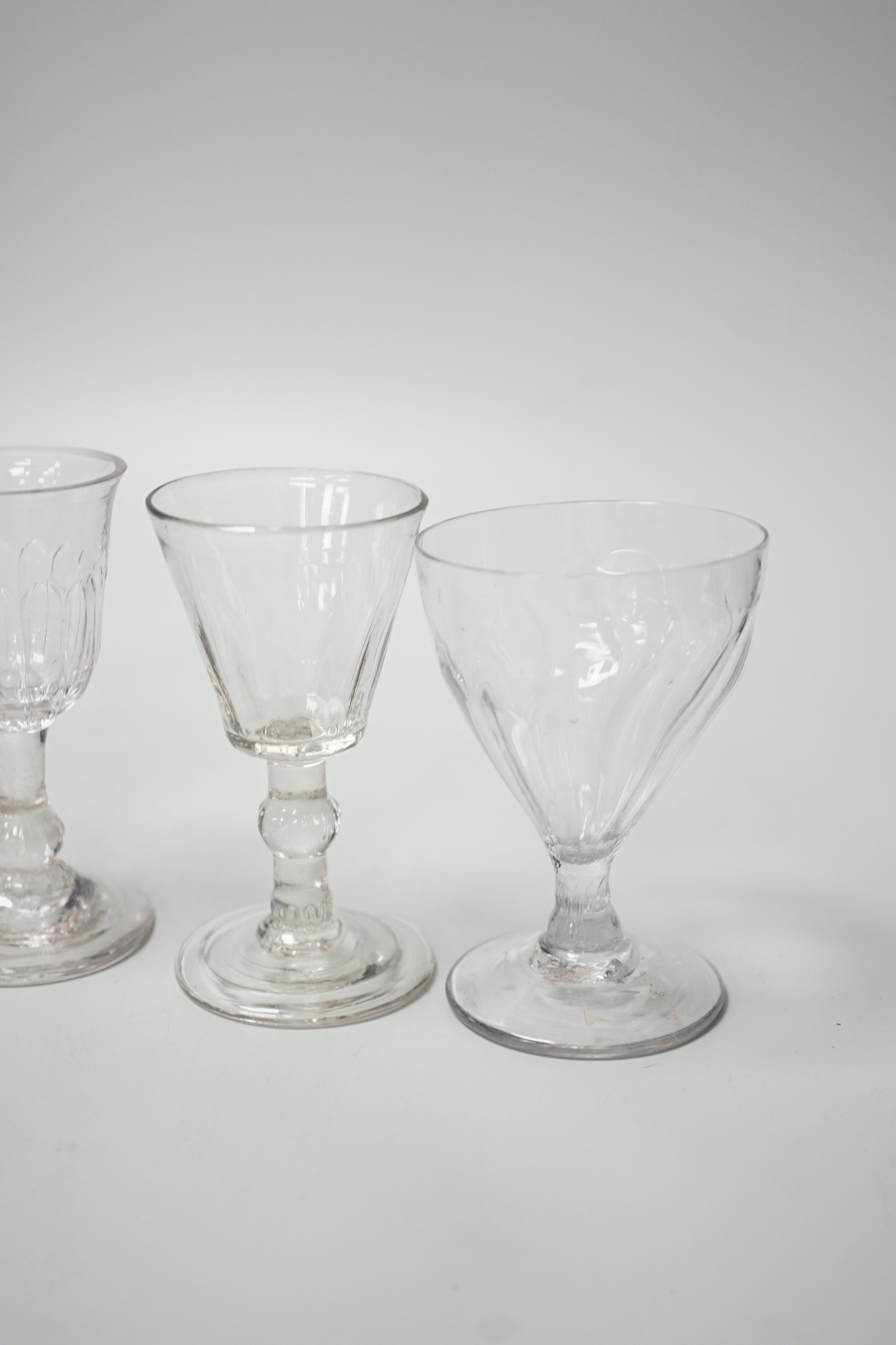 A small Georgian glass rummer and five cordials. Tallest 12cm